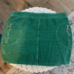 Green corduroy mini skirt